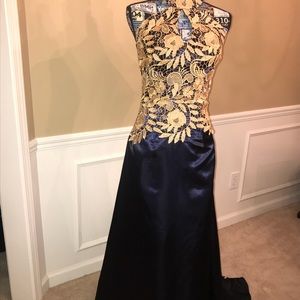 Floor length formal gown. Navy blue and gold